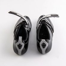 Load image into Gallery viewer, Flaps, one hand of course - for those who want everything at their command. And them who want even more options: the flap can be splitted into two straps also. The two Ys on the heel box facilitate entering the shoe and are auto-reflective - for more security in the dark..